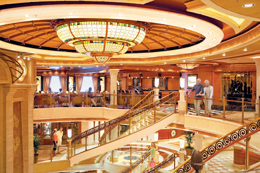 Regal Princess's large piazza-style atrium features beautiful spiral staircases, nearby live entertainment, shopping and dining options.
