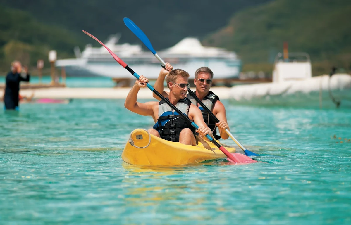 Motu_Mahana_kayaking - Off the coast of Taha'a in the Society Islands lies the islet of Motu Mahana, the Paul Gauguin's private retreat.