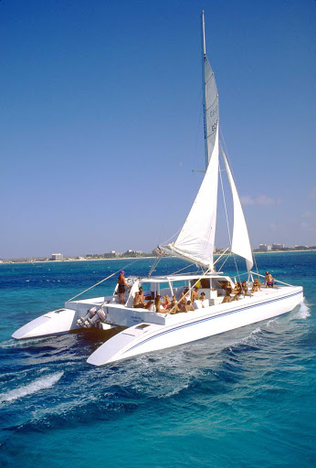 A catamaran sailing the waters of Aruba.
