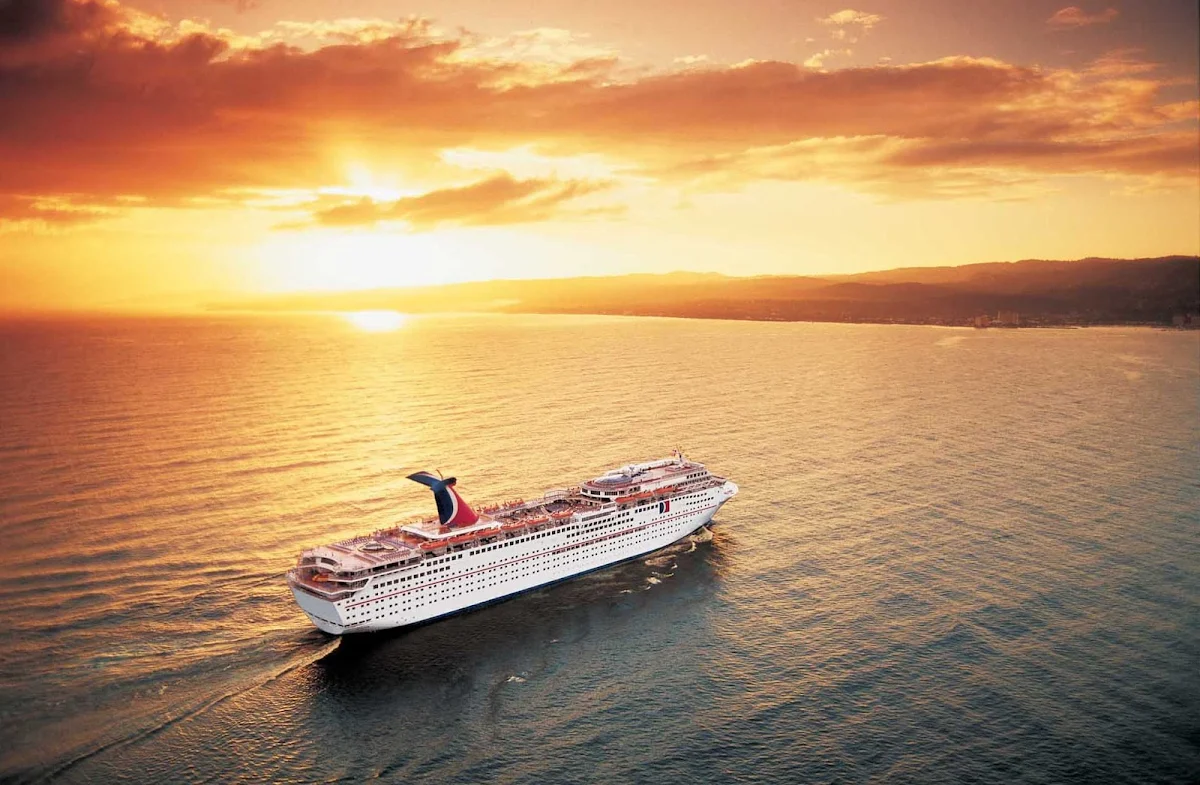 Carnival-Fantasy-sunset - Carnival Fantasy sails to Freeport, Little Stirrup Cay, Half Moon Cay and Nassau in the Bahamas and to Grand Turk. 