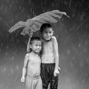 SMILE IN THE RAIN by Aad S. Ahmad - Babies & Children Children Candids