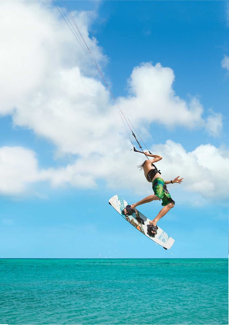 A kitesurfer catches some air in Aruba.