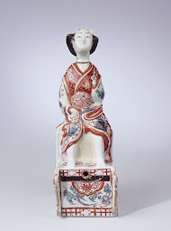 Spirit keg in the shape of a Japanese woman on a chariot