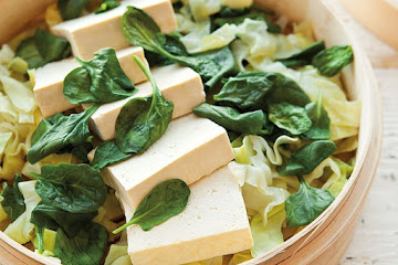 Steamed Tofu with Greens and Peanut Sauce