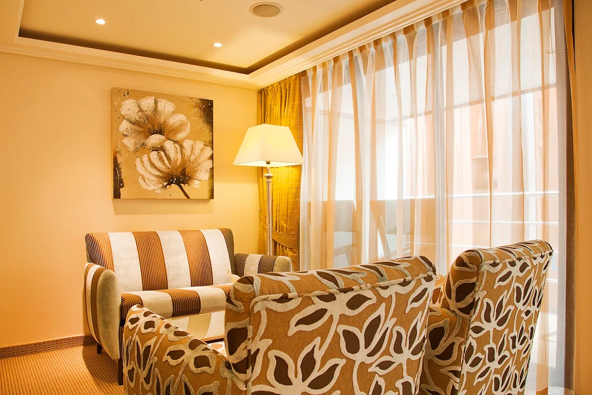 AmaVerde-Stateroom-Suite - A suite aboard AmaVerde comes with a a 350-square-foot living space, including French balcony and outside balcony, spacious wardrobe, shower and bathtub, flat-screen TV, Internet access and more. 