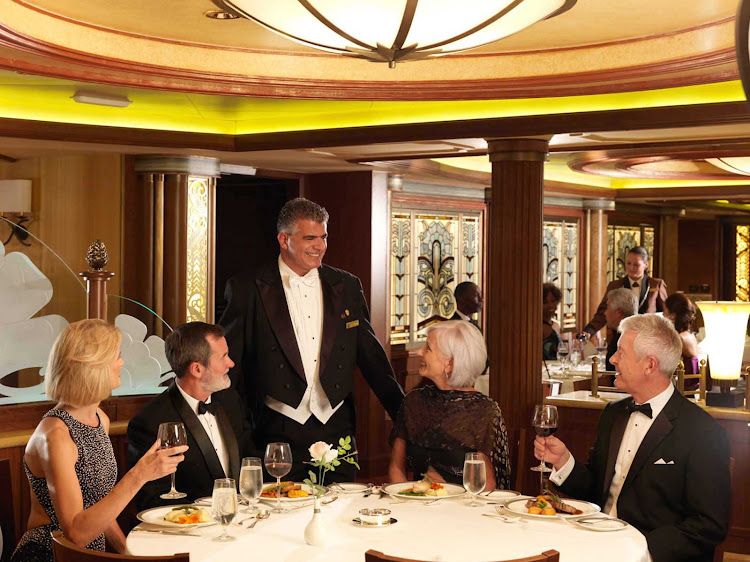 Diners and waiter at the Princess Grill aboard Queen Elizabeth.