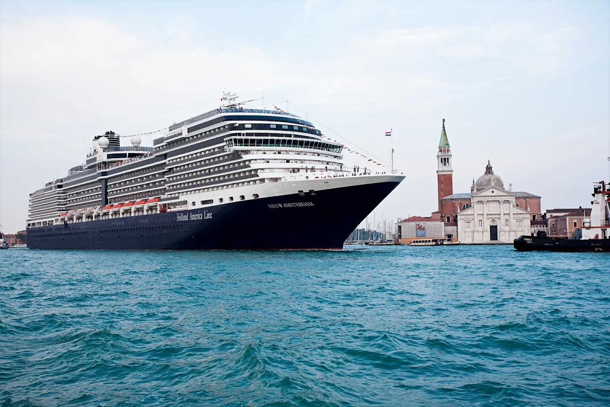 Holland-America-Nieuw-Amsterdam-in-Venice-2 - Nieuw Amsterdam sailing into Venice. Launched in Venice on July 4, 2010, Nieuw Amsterdam celebrates the cultural traditions of New York (named Nieuw Amsterdam once upon a time) with its interior design and art collection.