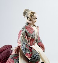 Pop, voorstellende het kindermeisje als naaister