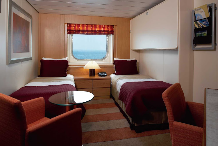 Celebrity Century's twin cabin with an ocean view.