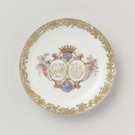 Saucer from the 'Swellengrebel service' with a double crowned monogram and a border with floral scrolls