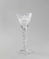 Wine glass with two clasped hands