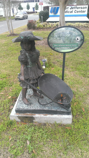 Wheelbarrow Girl Statue