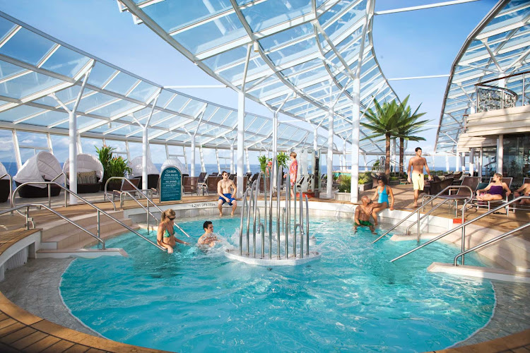 Take a dip in the refreshing waters of the Solarium's adults-only pool aboard Oasis of the Seas.