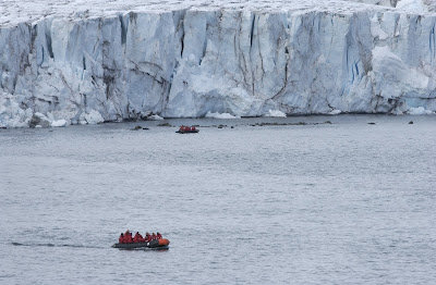 Now comes the fun part, cruising by Zodiac boat past glaciers and icebergs.