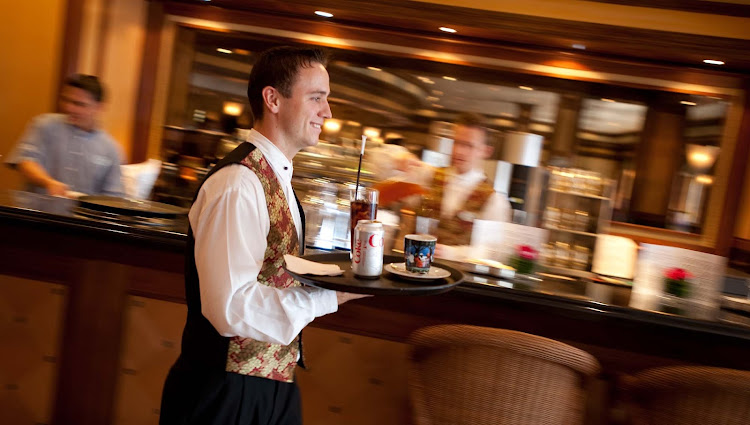 Waiters provide solicitous service in the Bistro of the Crystal Symphony.