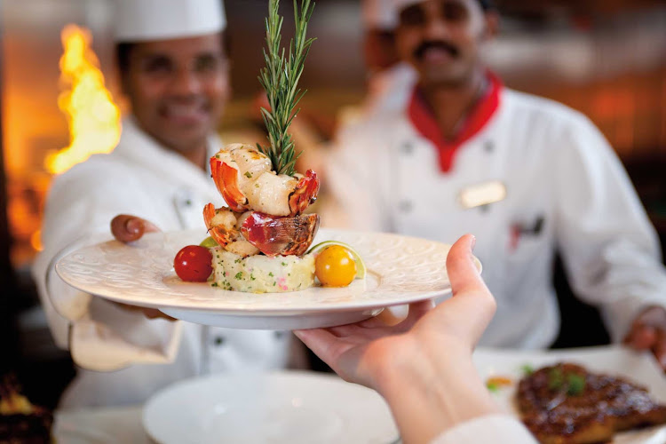A lobster tail entrée prepared at Chef's Table during a Carnival cruise.