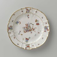 Rond bord, veelkleurig beschilderd met een Kakiemon-decor