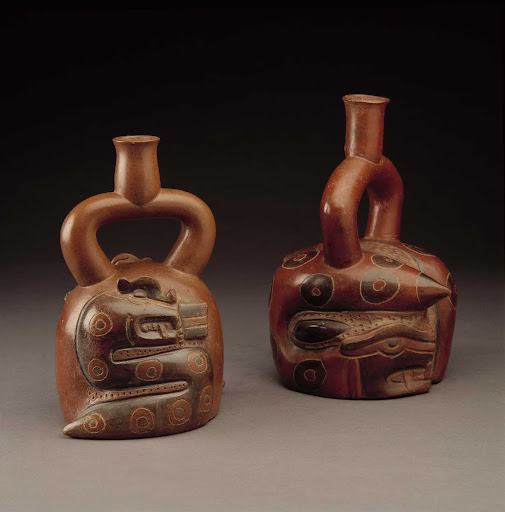 Sculptural ceramic ceremonial vessel that represents snakes (left) ML010481