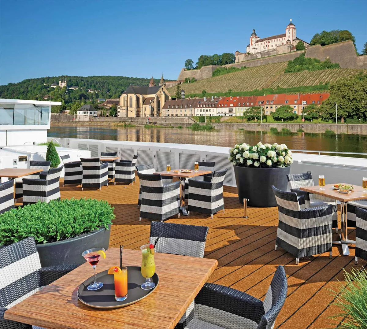 Scenic-Cruises-Balcony-Cabins - Balcony Cabin guests aboard Scenic enjoy magnificent views from spacious outdoor balconies, more than 20% larger than cabins of other river cruise ships.