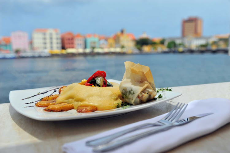 Keshi yena, gouda cheese stuffed with vegetables and meat or fish, is a favorite dish on Curacao with locals and tourists alike. 