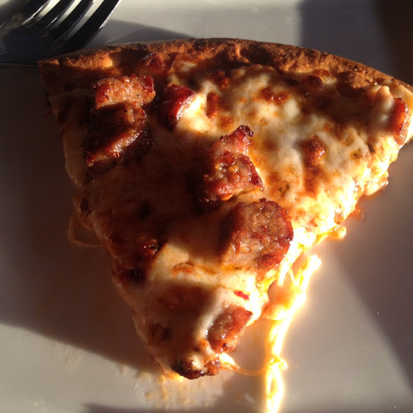 Pizza with Italian sausage.