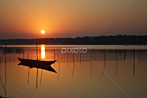 Sunrise at Chilka by Radeeh Ramesan -  