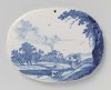 Two oval plaques with landscapes