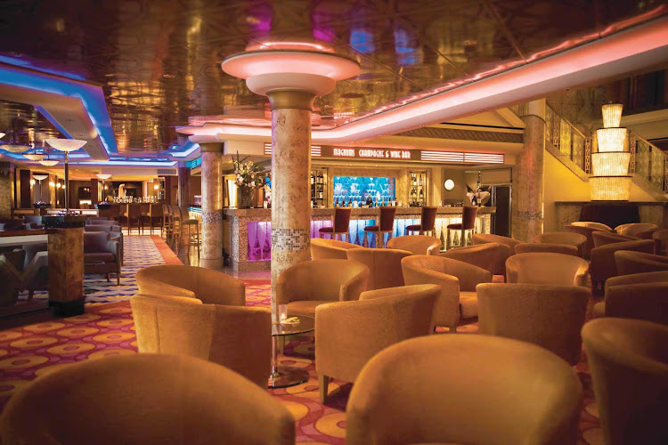 Relax with the drink and ambience of your choice at Norwegian Pearl's Bar Central, where a martini bar, a champagne bar, a whiskey and beer bar and a cigar club sit side by side.