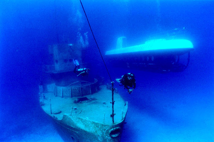 Cozumel submarine tours visit ship wrecks and reefs.