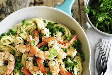 Angel hair pasta with prawn, pea and lemon sauce