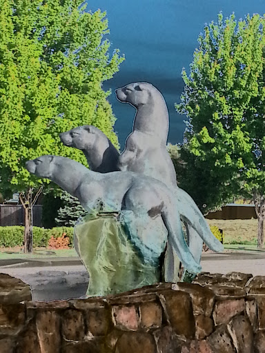 Three Otters Sculpture