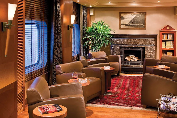 Relax in the rich, traditional setting of the Connoisseur Club with a rare vintage Cognac in hand during your Seven Seas Voyager cruise.