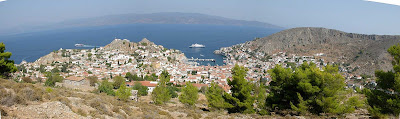 A SeaDream ship stops for guests to visit the harbor of Hydra, Greece.