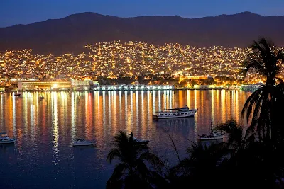 Acapulco shimmers at night.