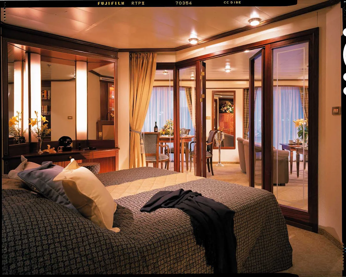 Silversea_Silver_Suite-1 - The Silver Suite aboard Silver Shadow rewards you with an extra room to spread out, a teak veranda with fine patio furniture and a luxurious marbled bathroom.