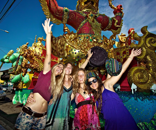 Visitng revelers join in during a parade in Panama.