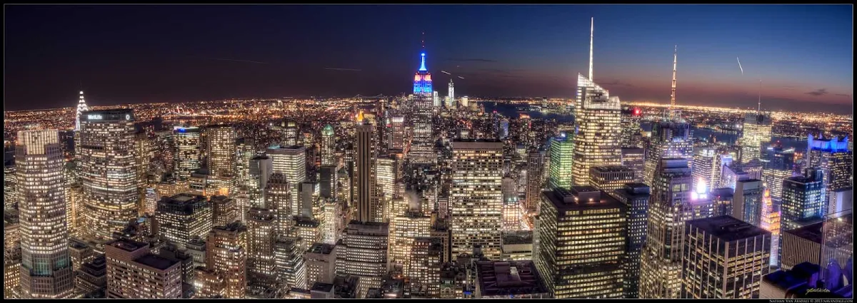 Manhattan-skyline-at-night - View of midtown Manhattan from atop Rockefeller Center. 