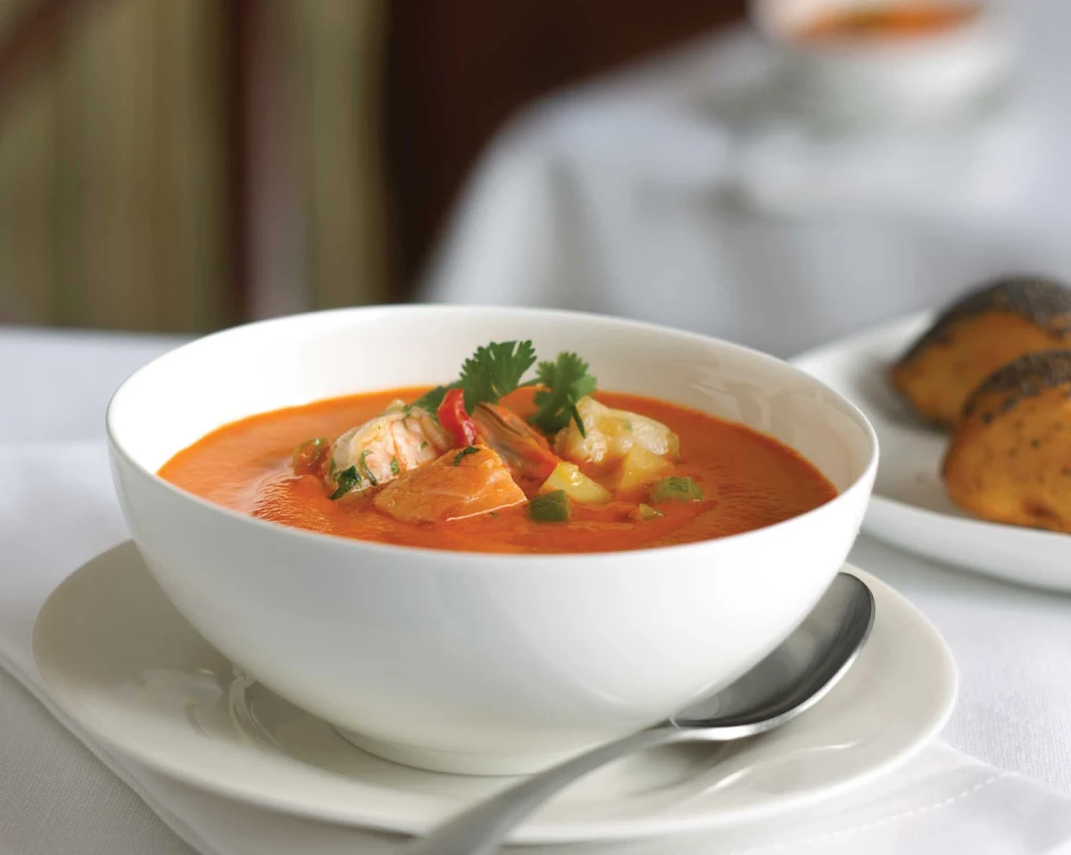 Royal-Caribbean-dining-fish-tomato-chowder - Fish and Tomato Chowder, a popular soup on Royal Caribbean voyages.