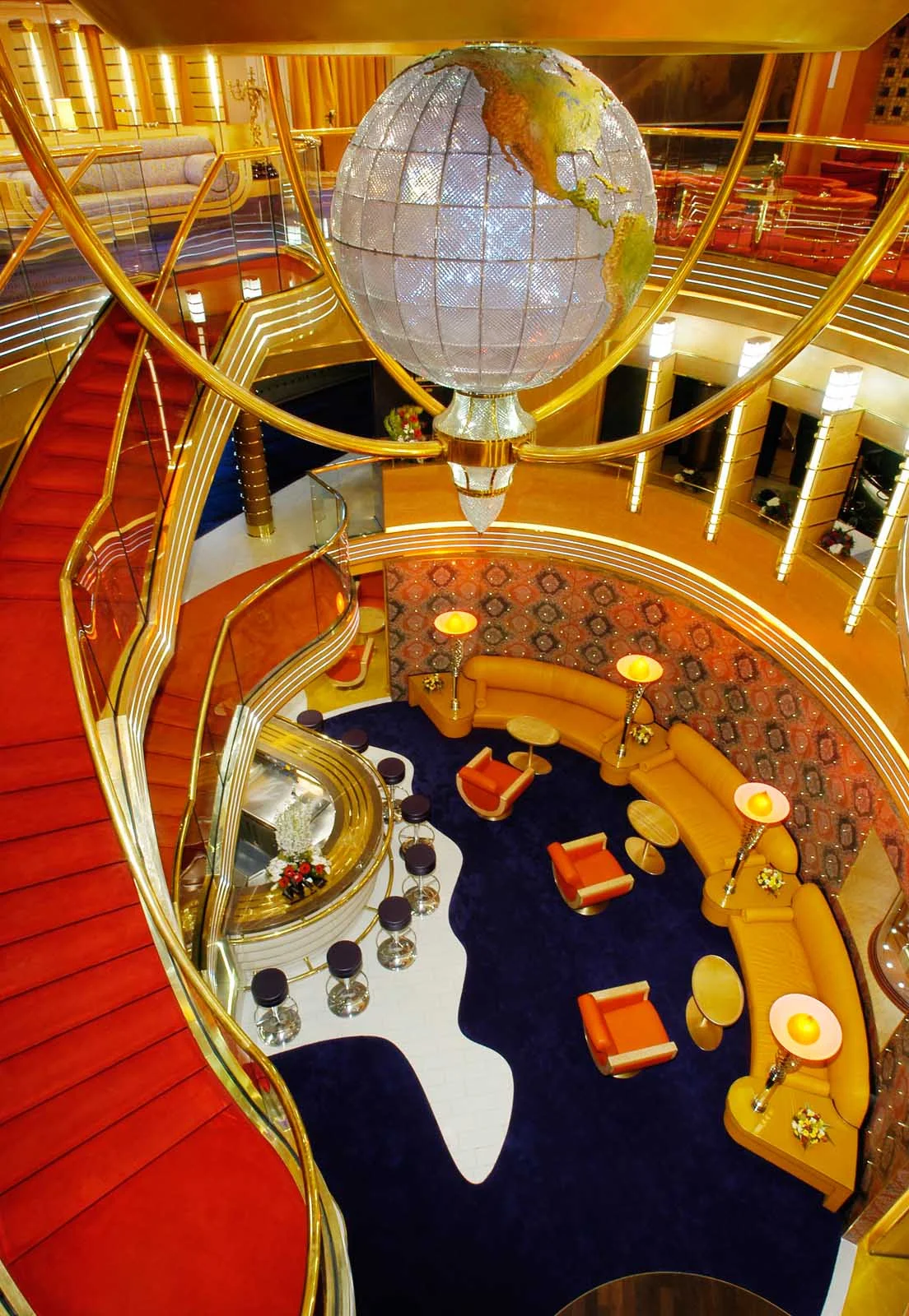 Holland-America-Oosterdam-Atrium - The centerpiece of Holland America Line's Oosterdam is a Waterford crystal globe, prominently displayed in a three-story atrium.
