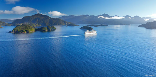 Cruise_a_World_Heritage_area - From a steamer chair on the Promenade Deck, take in the spectacular sights of Fiordland — which has has World Heritage status. You’ll seeing the untouched scenery that impressed Captain Cook when he sailed into Fiordland more than 230 years ago.  