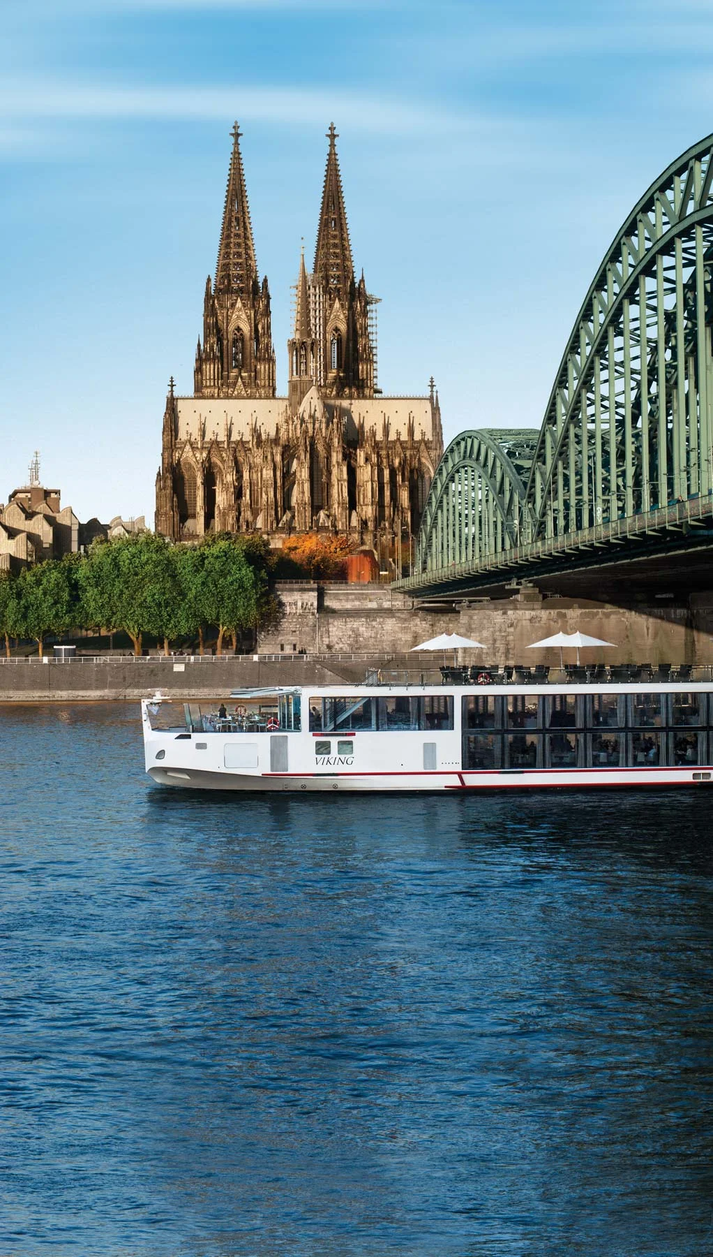Viking-Longship-Cologne-Germany - Explore the classic architecture of Cologne, Germany, as you sail the Rhine under the famous Hohenzollern Bridge aboard the Viking Atla, Viking Jarl or Viking Tor. 