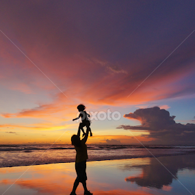 Sunset Fun by Wei Fuk Lie - People Street & Candids