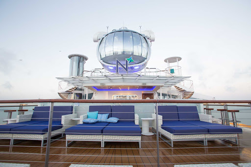 Sun chairs in front of the North Star aboard Quantum of the Seas.