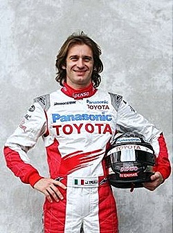 jarno trulli, panasonic toyota, red, white, black-and-white helmet, long-haired man, picture, photo, f1 pilot, driver f1, racer, formula one, grey wall