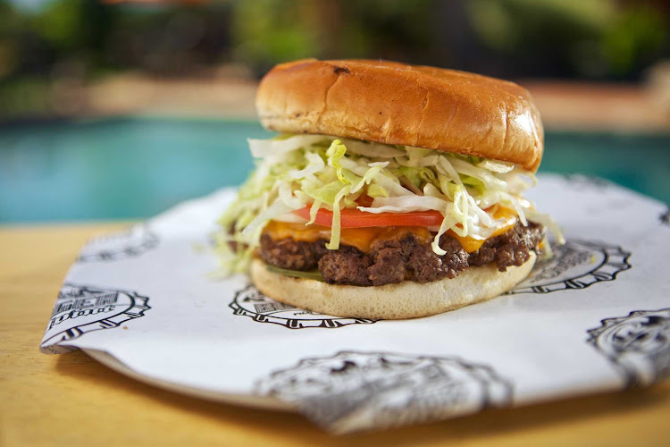 The traditional Straight Up burger of Guy's Burger Joint available aboard a Carnival cruise.