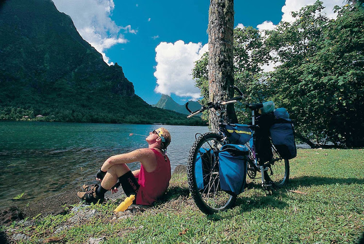 By biking on Mo'orea, you can choose your own path to see the island's sites.
