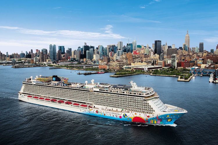 Guests on Norwegian Breakaway take in a sweeping view of New York as the ship sails to her next destination.