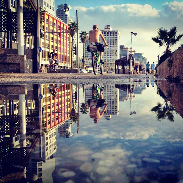 Bike rider on the promenade in Tel Aviv.