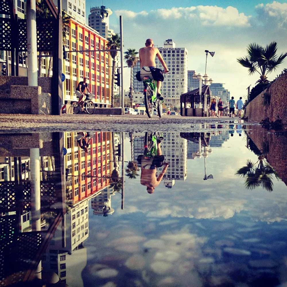 bike-tel-aviv - Bike rider on the promenade in Tel Aviv.