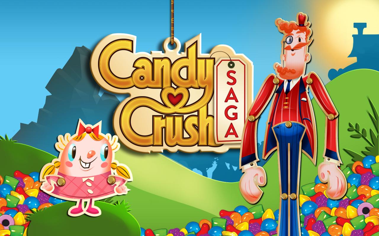 immagine di candy crush saga con omino rosso e bambina rosa e caramelle